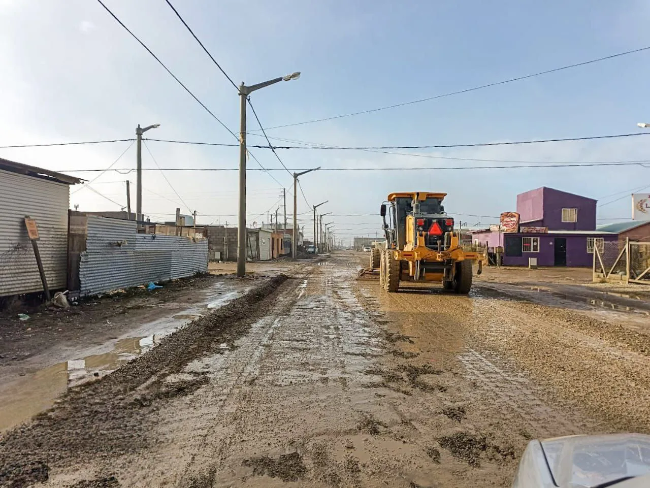 Maquina calle lluvia