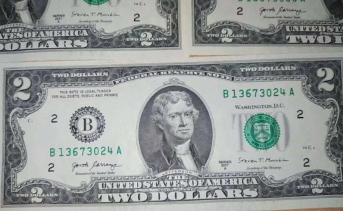 2 dólares 1